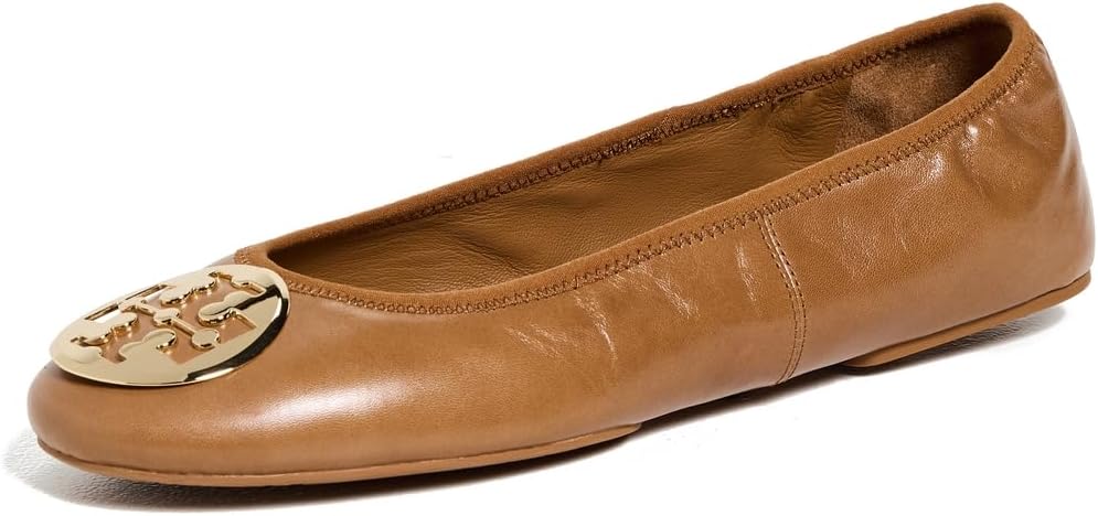 Tory Burch brown and nude colored ballet flats with the gold logo on the tip of the shoe's toe.